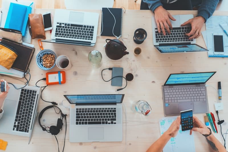 Team collaborating at a busy workspace