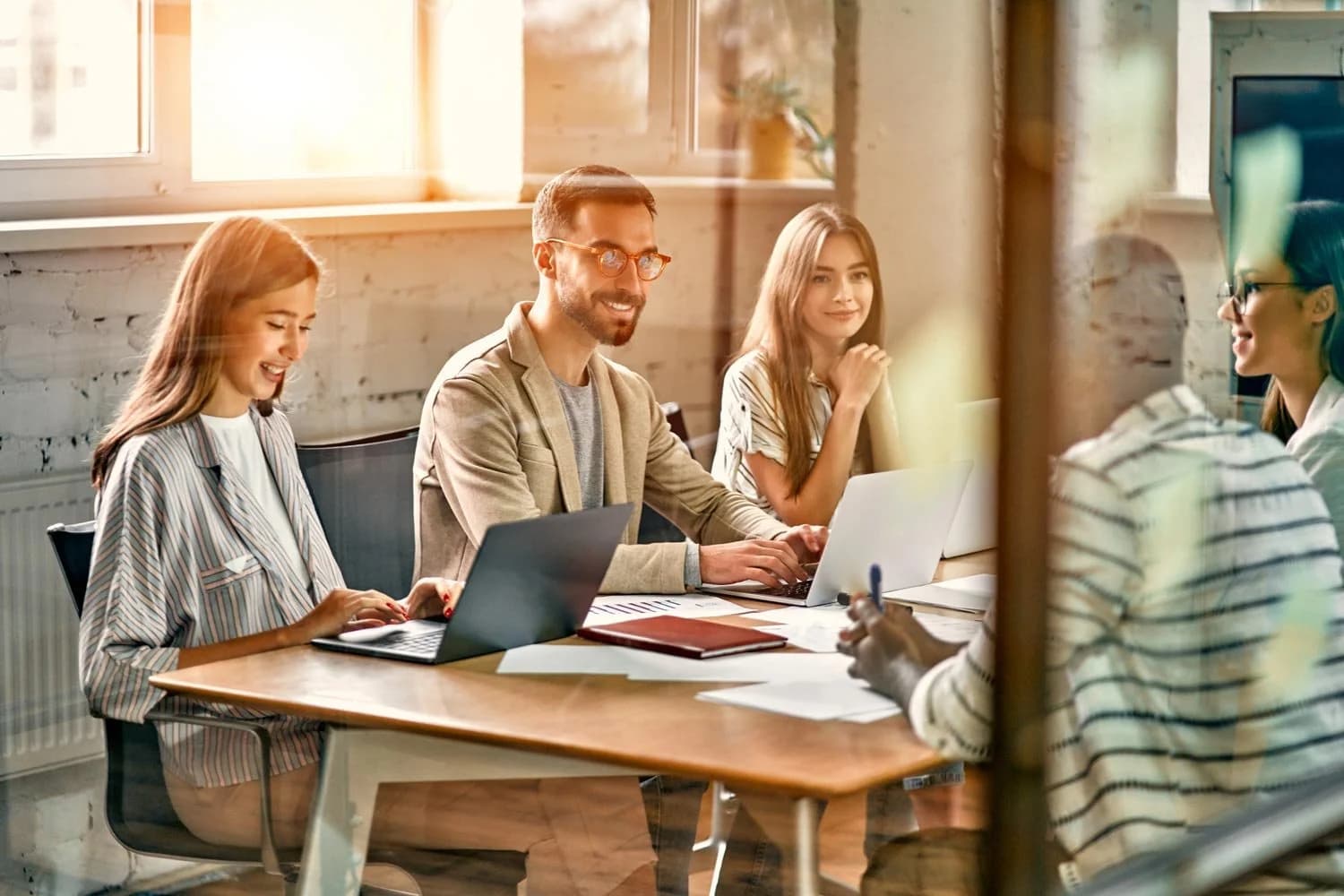 Business leader working with team members